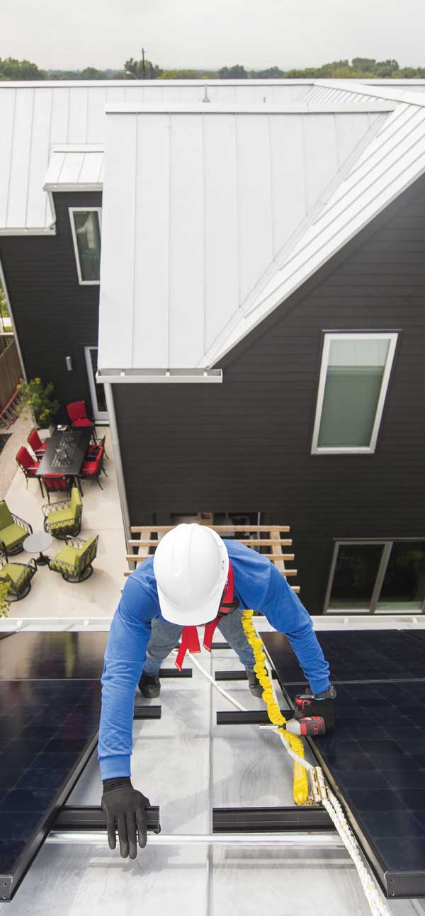 A Solar Energy Partners expert from Solar Energy Partners, one of South Carolina & Georgia's best residential solar companies, installing solar on a roof.