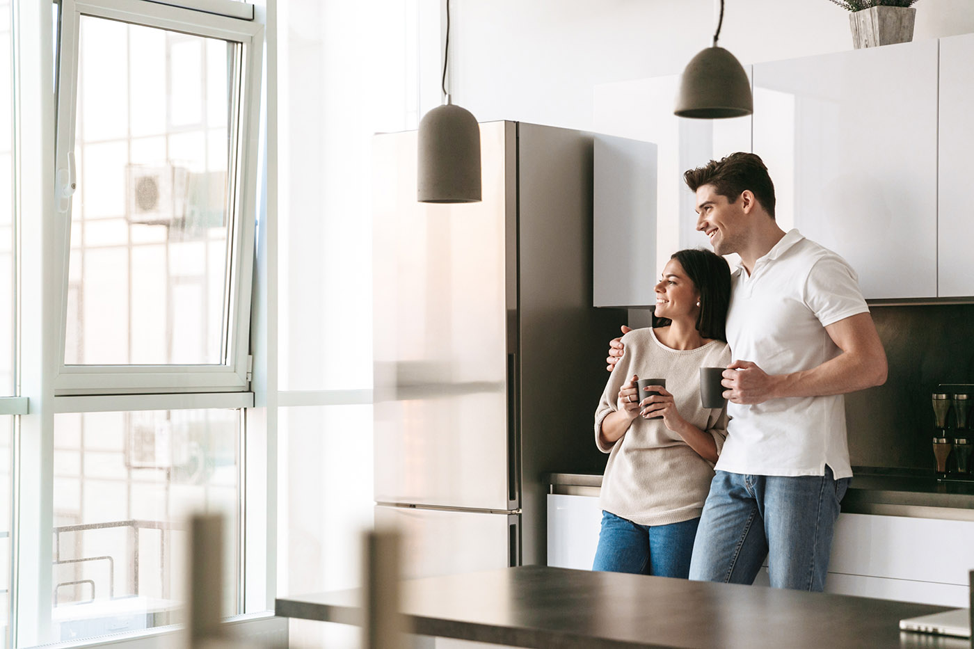 A couple enjoying the energy efficiency in their home - installation services provided by Solar Energy Partners in South Carolina & Georgia.