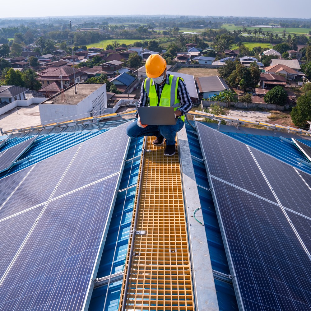 A solar expert working on a home, services provided by Solar Energy Partners.